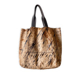 Upcycled cowhide tote by Volta