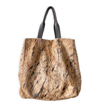 Upcycled cowhide tote by Volta