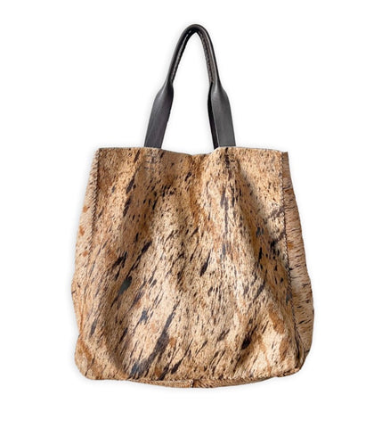 Upcycled cowhide tote by Volta