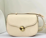 Leather handbag gold circle closure