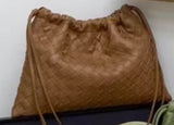 Leather woven cinch bag