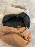 Woven leather clutch