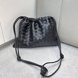 Leather woven cinch bag