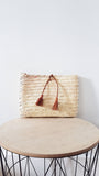 Moroccan straw clutch with leather