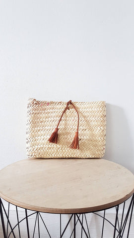 Moroccan straw clutch with leather