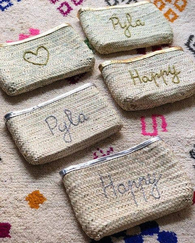 Customized straw clutch cute and chic came in silver or gold