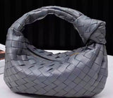 Woven leather clutch