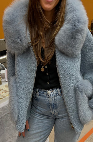 Light blue fox fur hood and pockets jacket