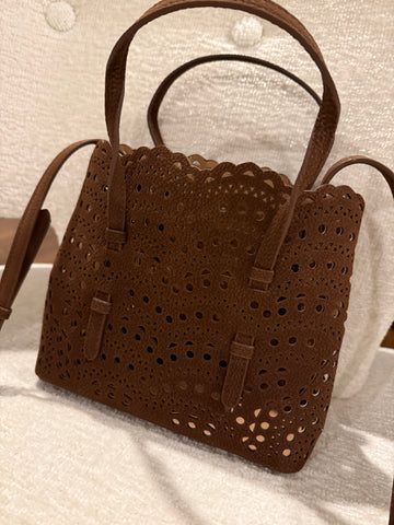 Laser cut chocolate suede bag