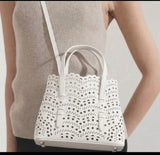 Laser cut leather bag - small
