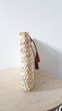 Moroccan straw clutch with leather
