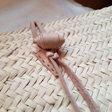 Moroccan straw clutch with leather