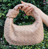 Woven clutch vegan leather